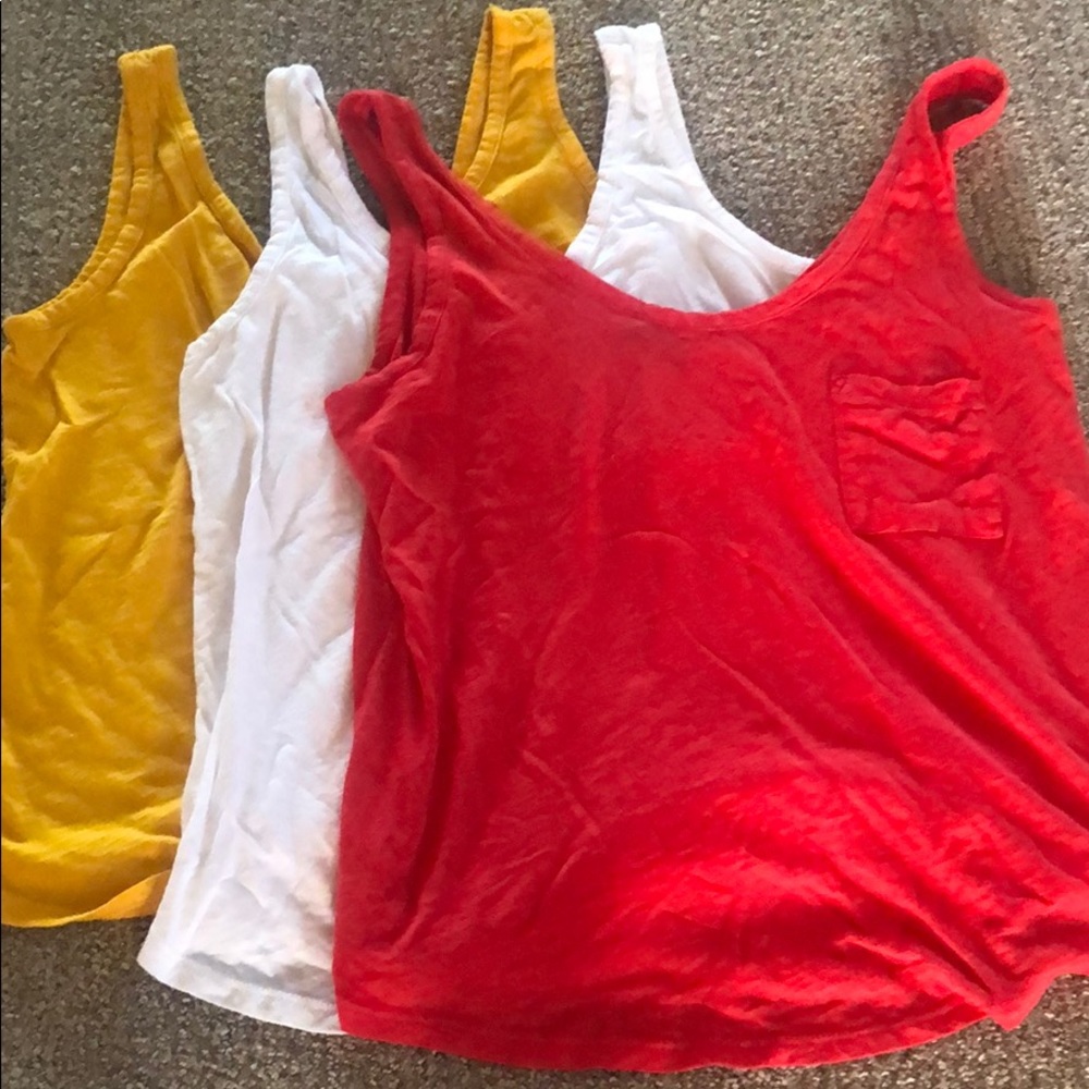 Tank tops with one front pocket.